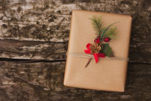 Christmas gift box on wooden background